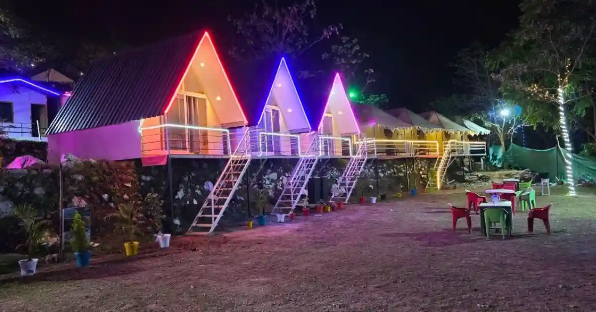 A-frame cottage exterior at night